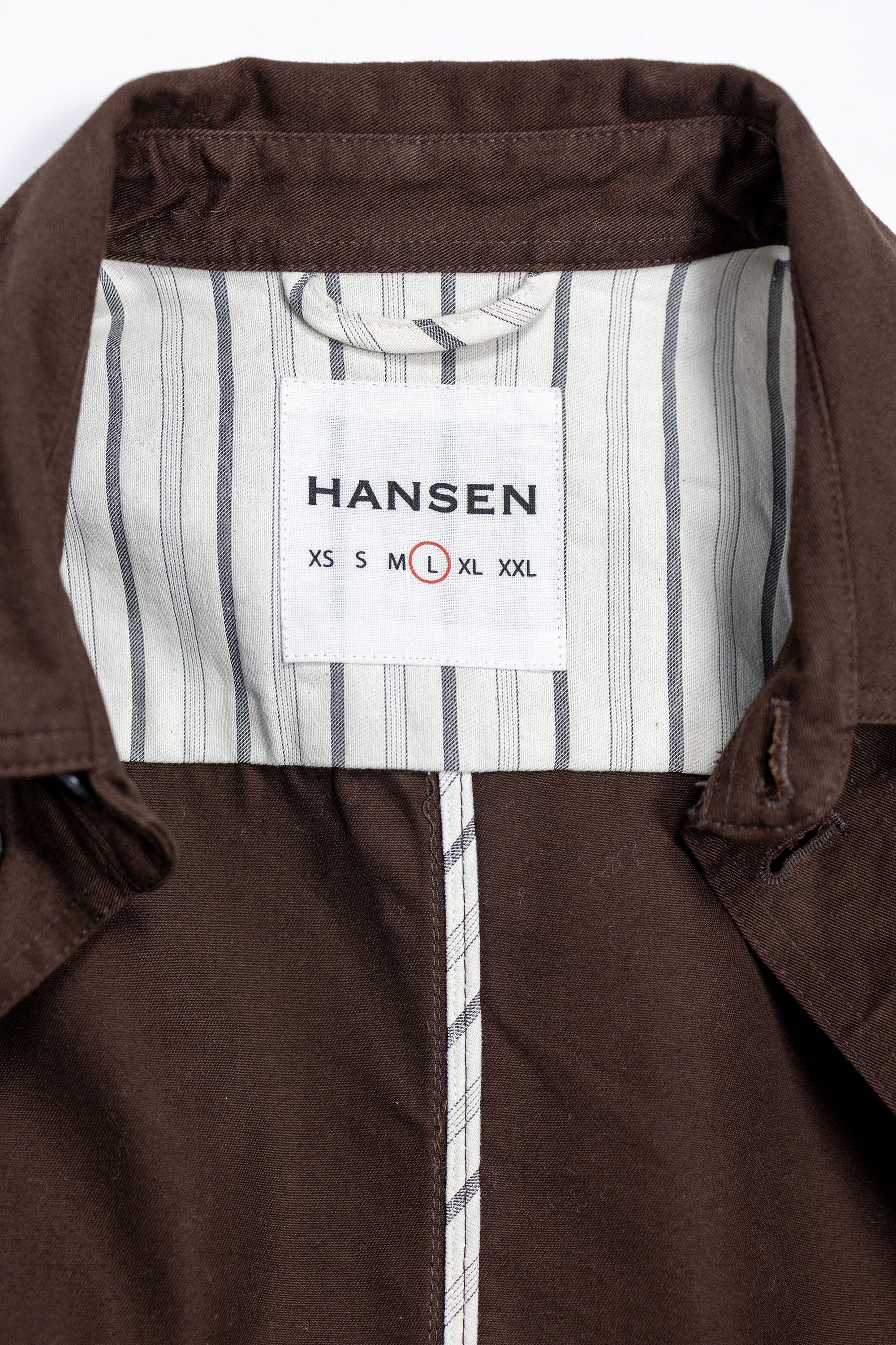 Hansen Garments Bendik Workwear Jacket - Chestnut - product shot - front facing - white background - close up detail of collar detail and brand tag.