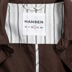 Hansen Garments Bendik Workwear Jacket - Chestnut - product shot - front facing - white background - close up detail of collar detail and brand tag.