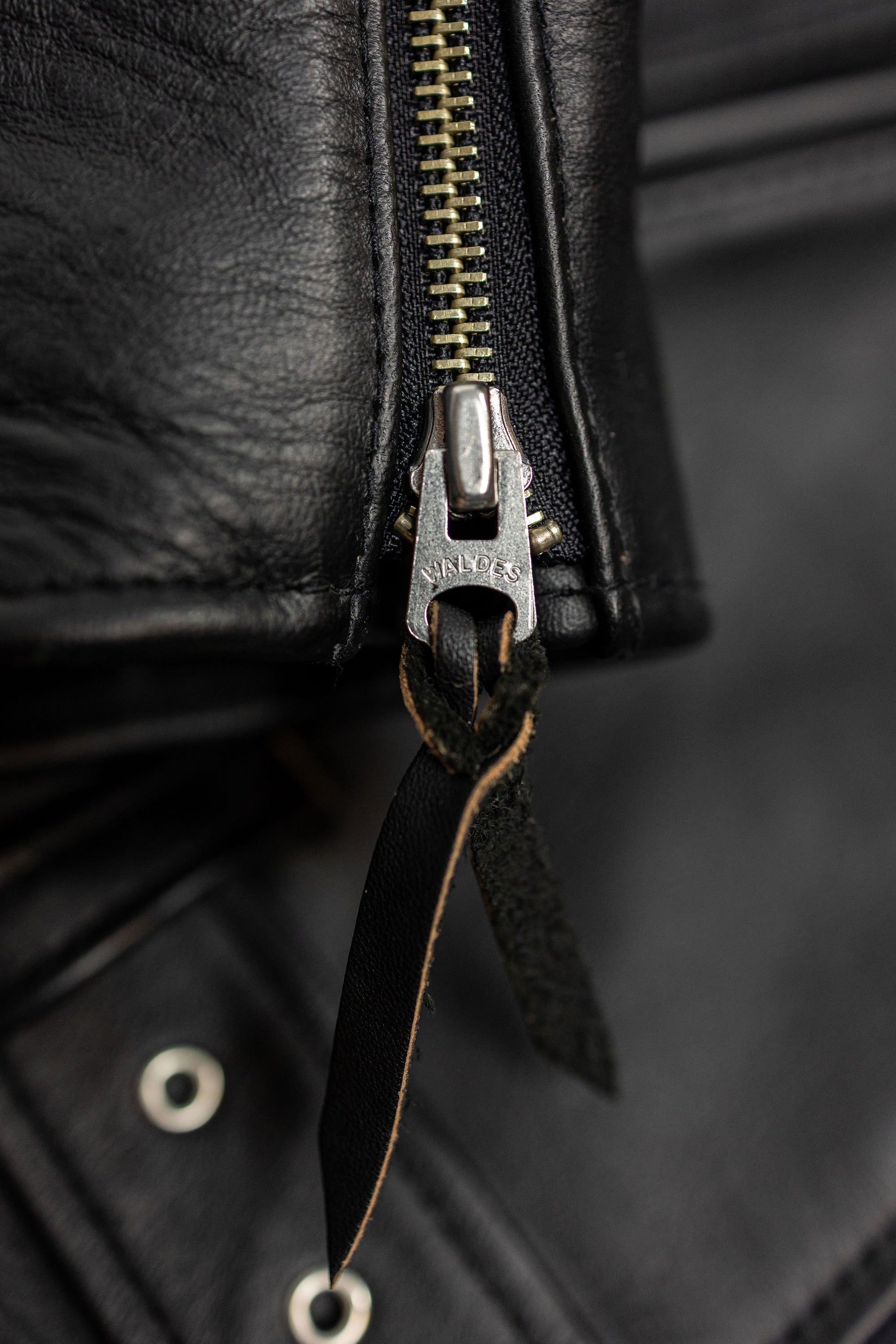 Y'2 Sumi Dyed Leather Jacket- detail of cuff zipper