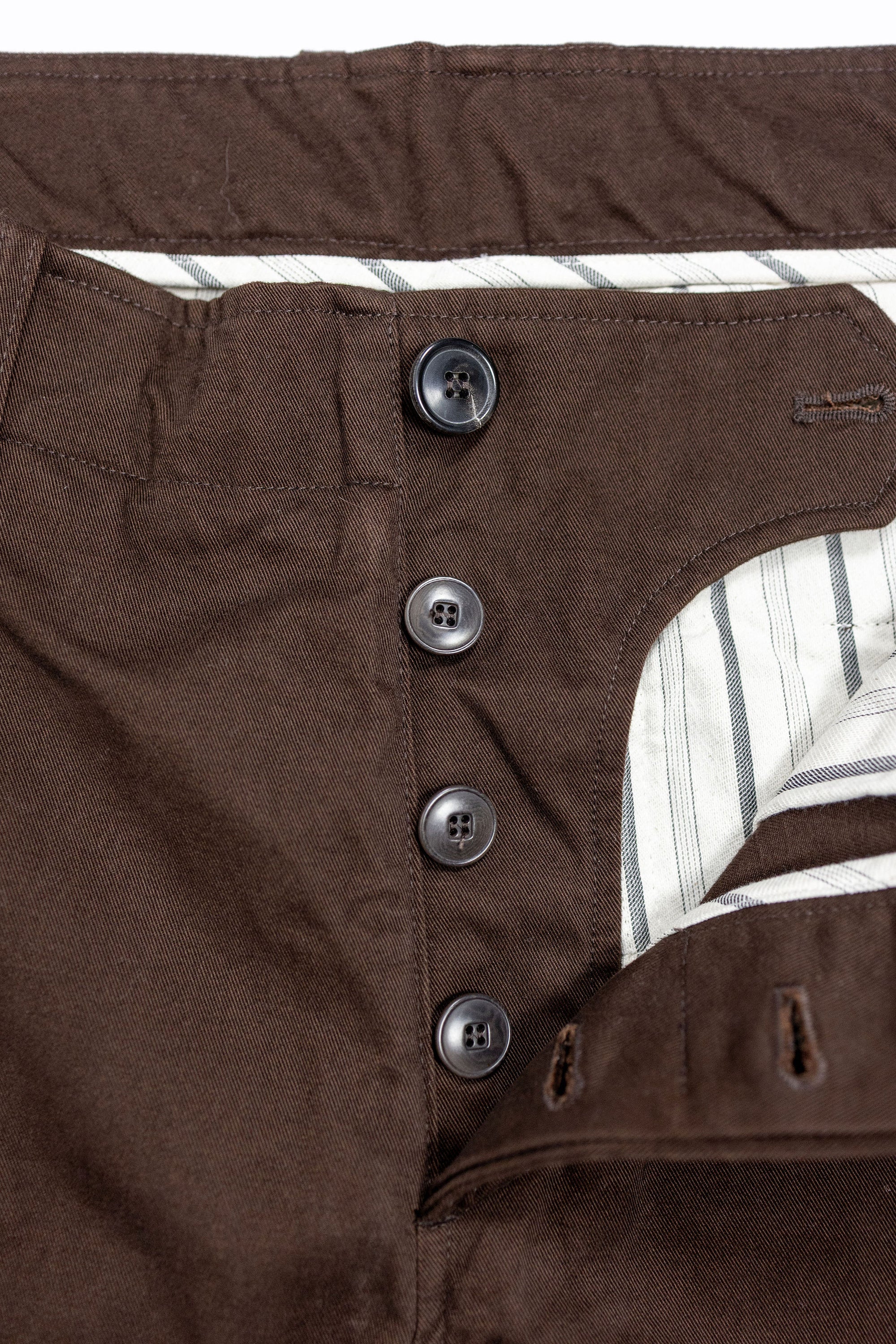 Hansen Garments Bobby Wide Pleated Trousers - Chestnut - product shot - front facing - white background - pants open - detail of buttons and interior