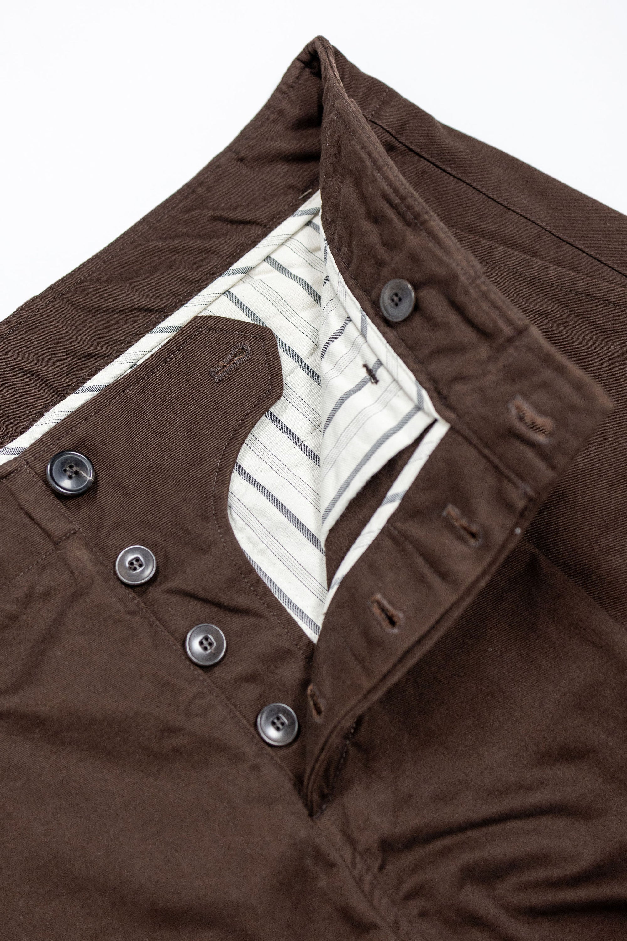 Hansen Garments Bobby Wide Pleated Trousers - Chestnut - product shot - front facing - white background - pants open - detail of buttons and interior