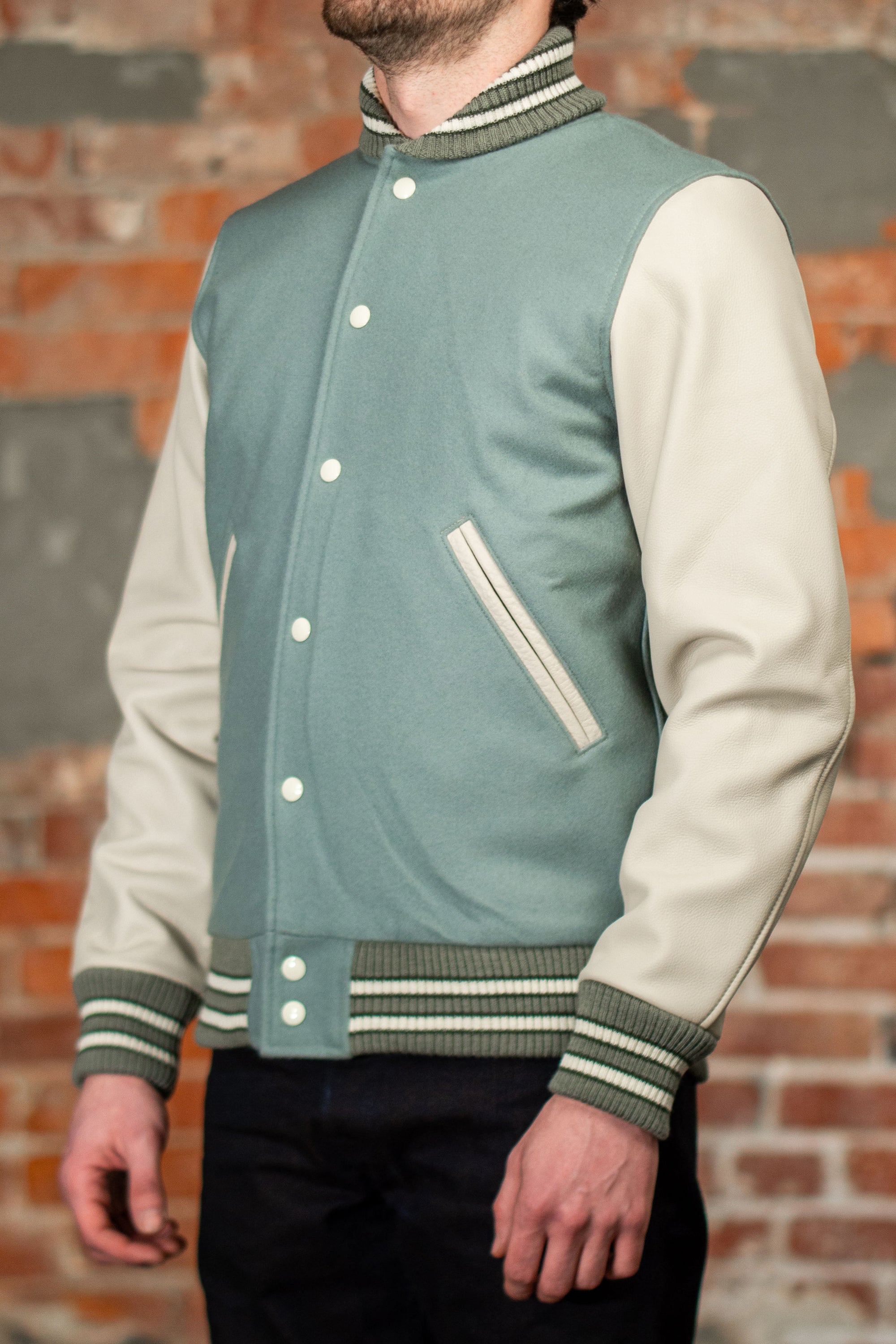 Dehen 1920 Varsity Jacket - Reef Wool / Milk Leather. on model side profile