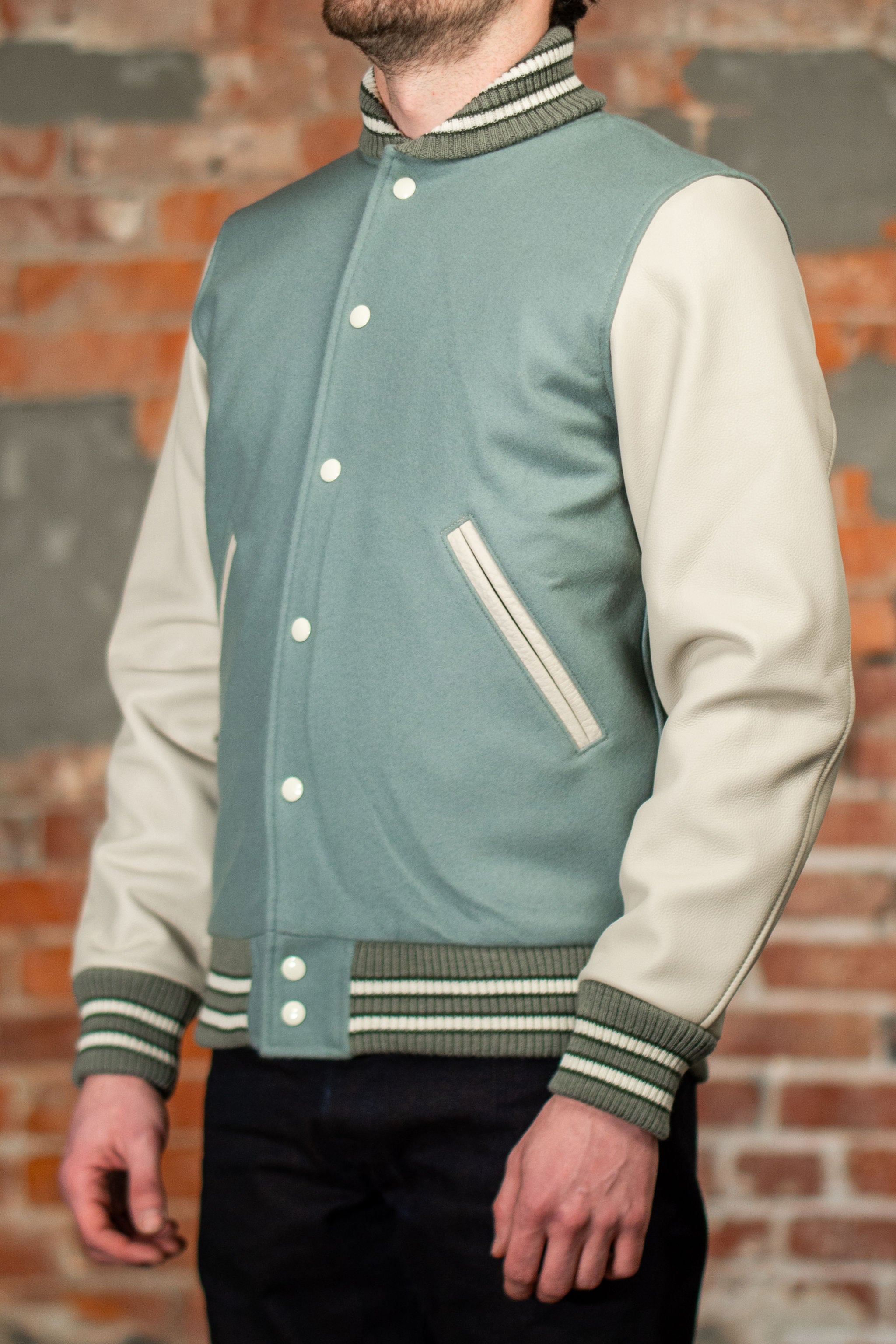 Dehen 1920 Varsity Jacket - Reef Wool / Milk Leather. on model side profile