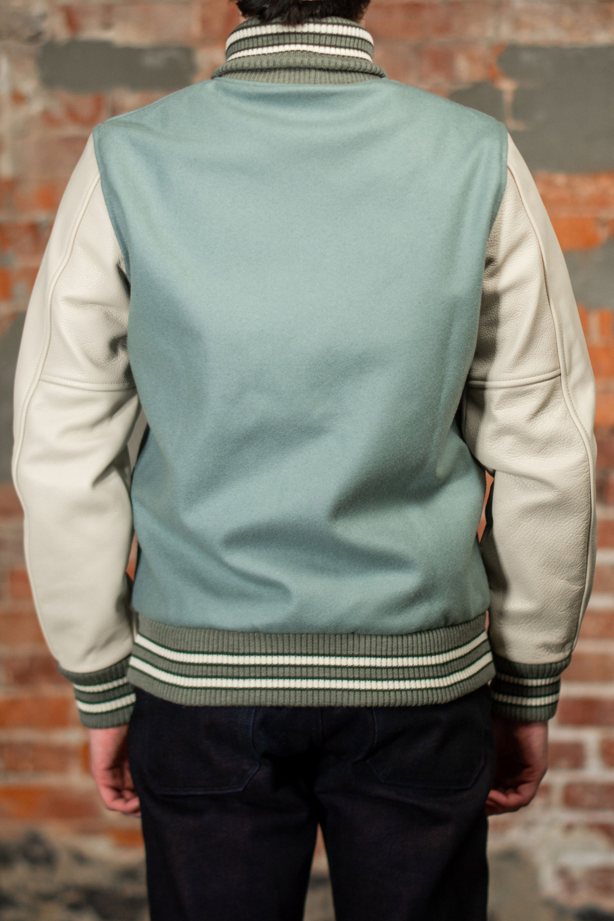 Dehen 1920 Varsity Jacket - Reef Wool / Milk Leather. on model back profile