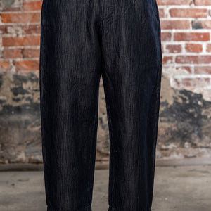 Hansen Garments Emir Loose Drawstring Pants - Navy Dobby - close up - waist down - brick background - front facing