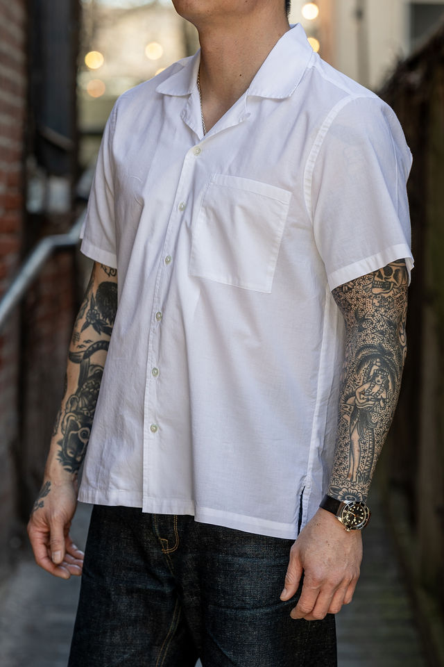 Hansen Garments Caleb Short Sleeve Cabana Shirt - White - model shot - side facing - alleyway backdrop
