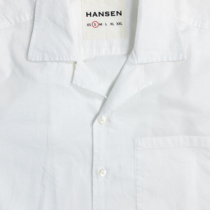 Hansen Garments Caleb Short Sleeve Cabana Shirt - White - product shot - front facing - white backdrop - detail shot of collar, buttons, and brand tag