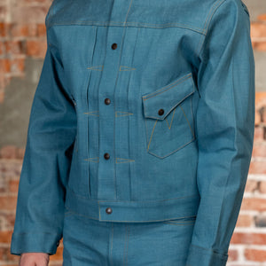 Light blue denim jacket side view on model