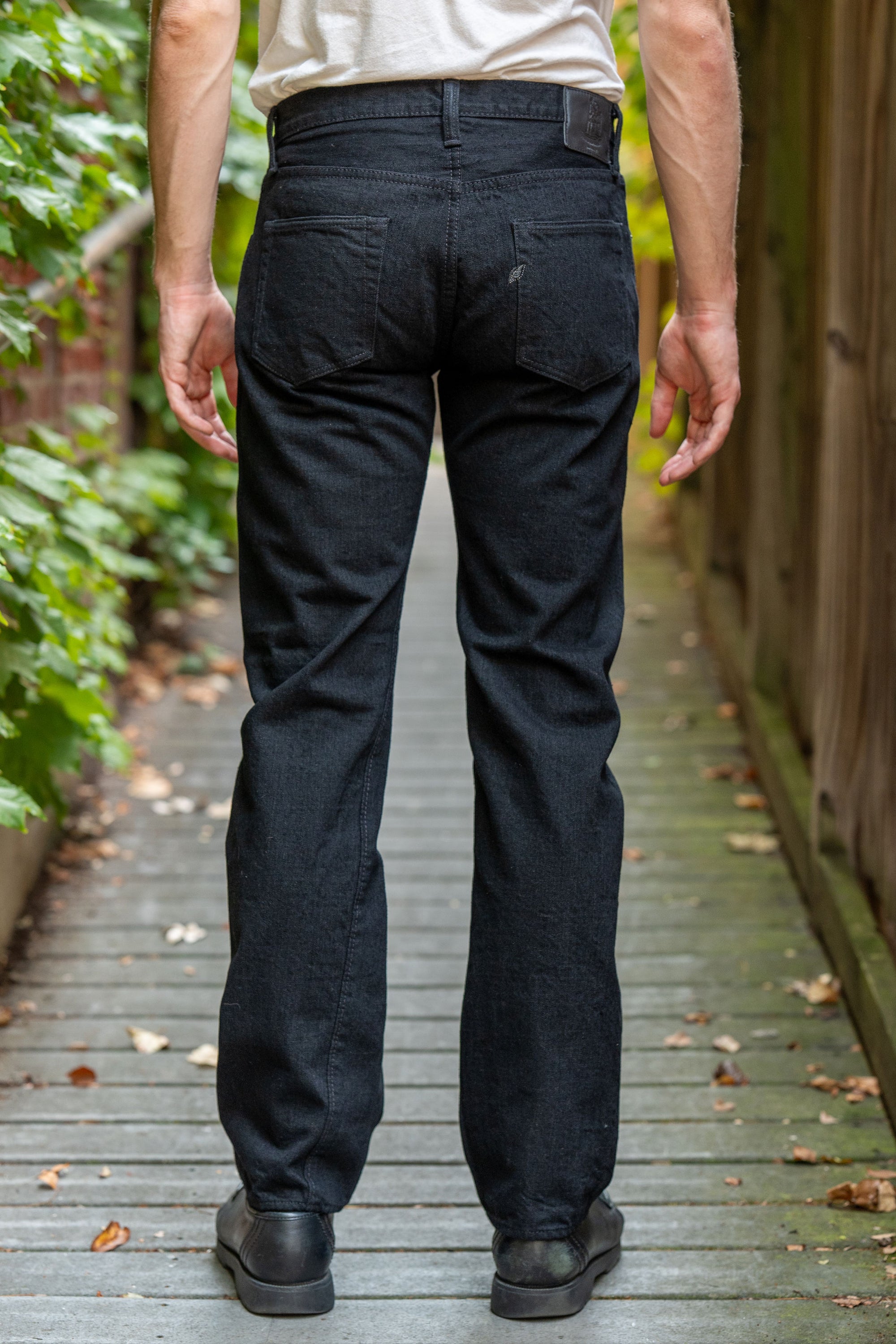 Pure Blue Japan XX-003-BK Regular Straight - 14oz Double Black (Washed). on model back profile.