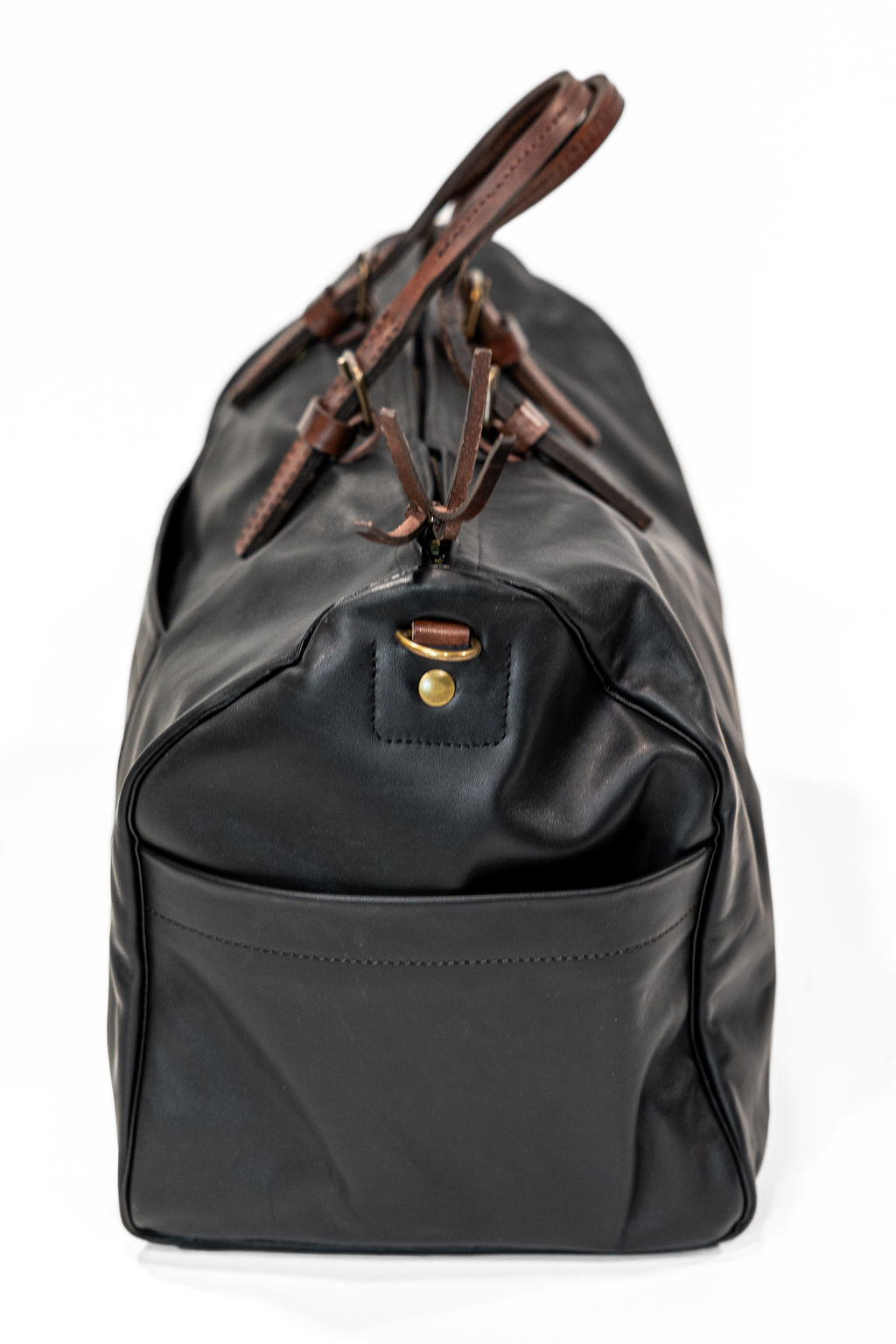 Black leather duffel bag with pockets and brown leather handles side two view