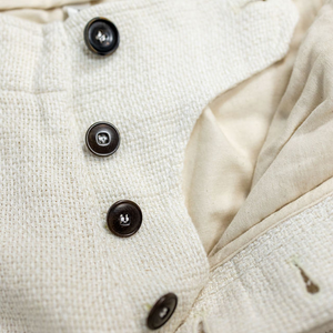 Hansen Garments Bobby Wide Pleated Trousers - Off White Gauze - product shot - close up - detail of buttons