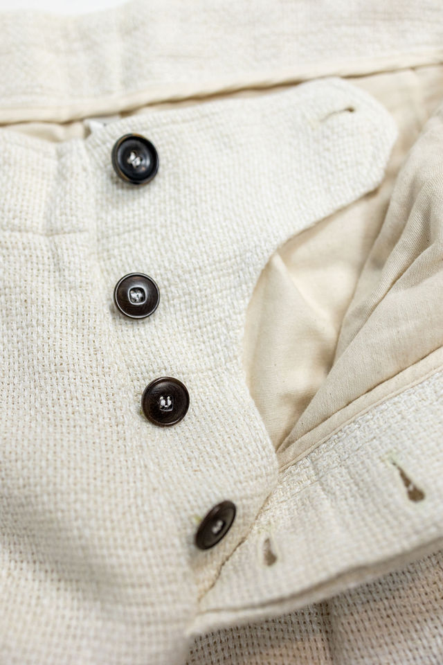 Hansen Garments Bobby Wide Pleated Trousers - Off White Gauze - product shot - close up - detail of buttons