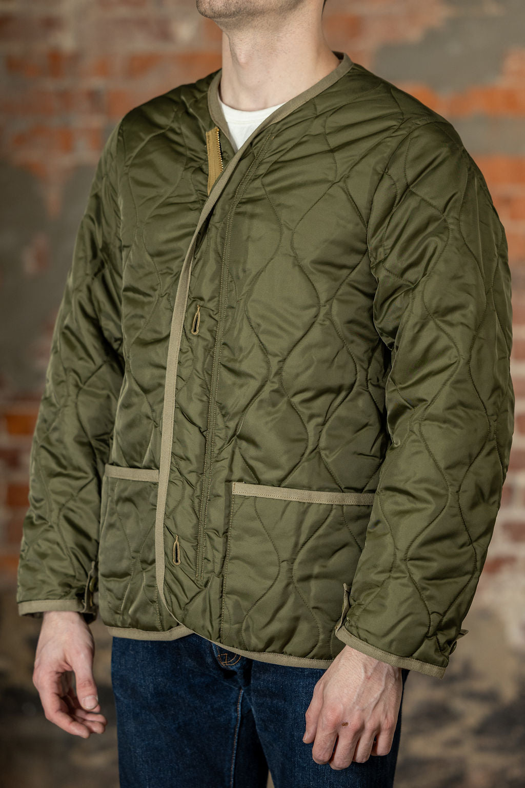 Buzz Rickson's BR15754 Type M-65 Liner in Olive - On model, facing side