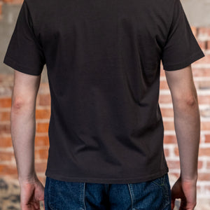 Faded black premium t-shirt back view on model