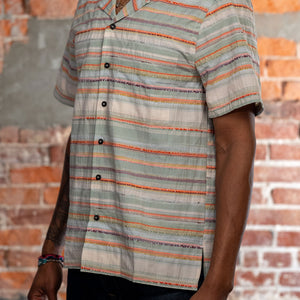 Hansen Garments Caleb Short Sleeve Cabana Shirt - Multicolor - model shot - side facing - brick background