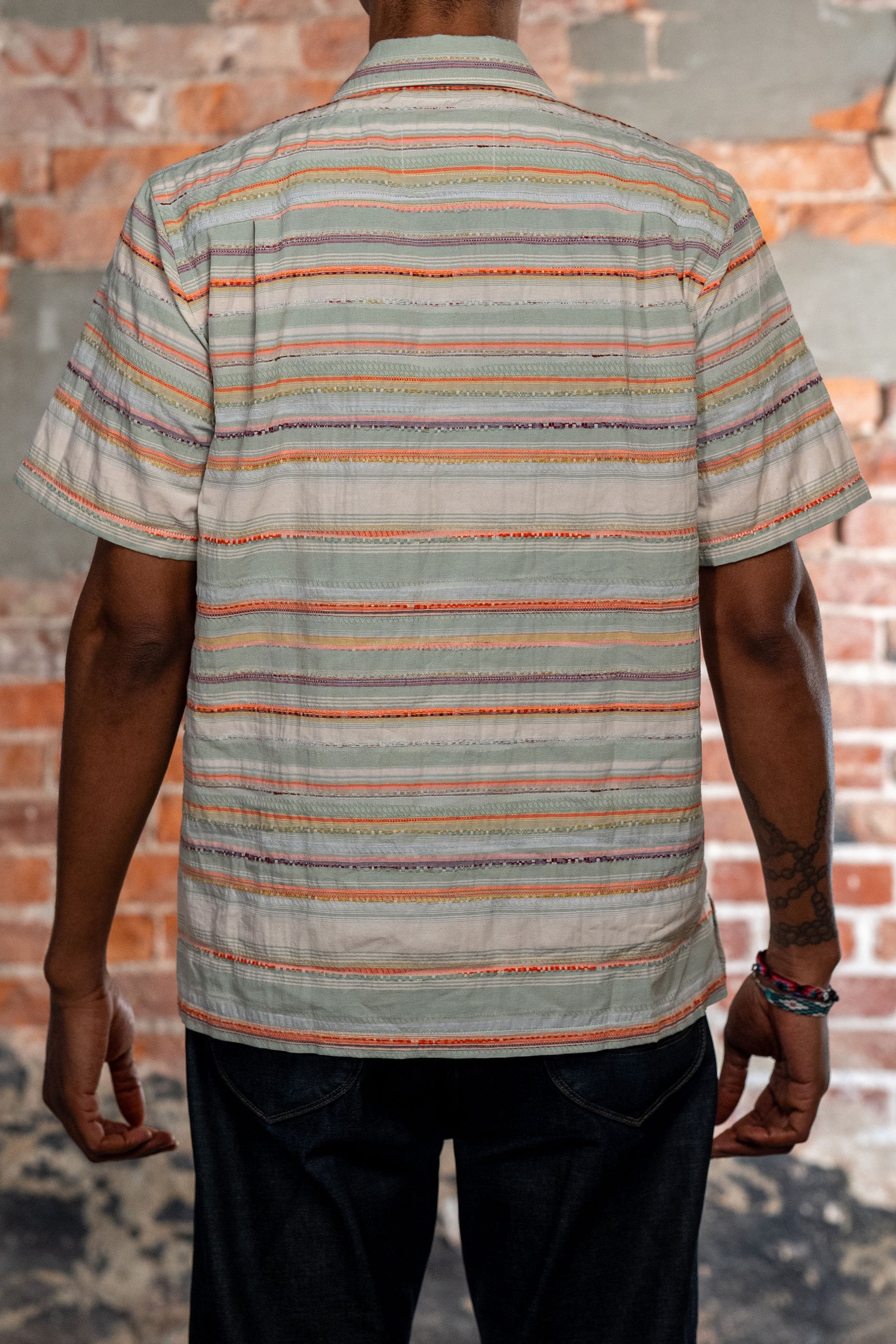 Hansen Garments Caleb Short Sleeve Cabana Shirt - Multicolor - model shot - back facing - brick background