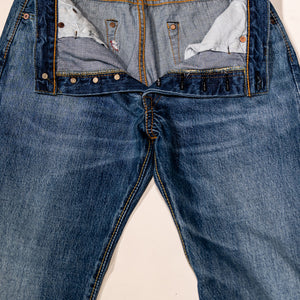 Pure Blue Japan USED-003-ID Regular Straight - 14oz Natural Used Wash Indigo x White. laid on back with buttons undone and opened