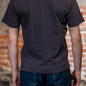 Dark blue premium t-shirt back view on model