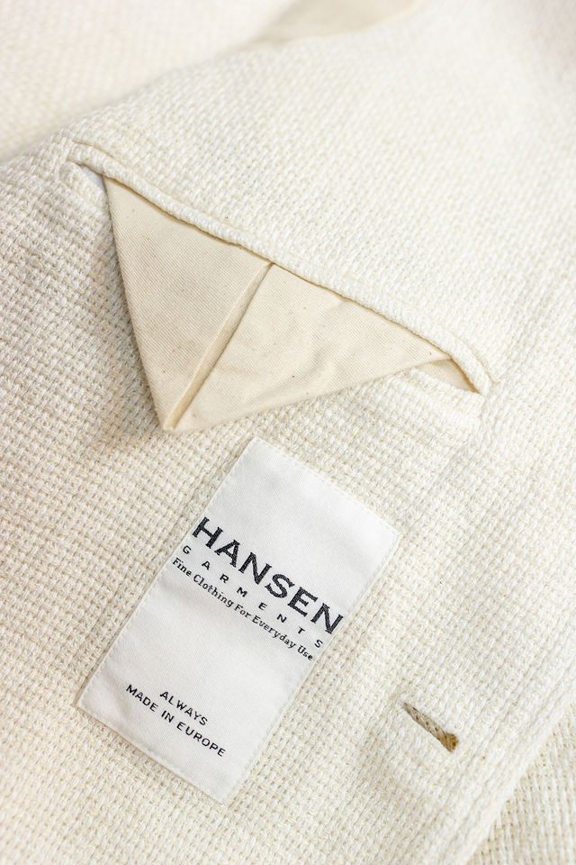 Hansen Garments Charlie Three Button Blazer - Off White Gauze - product shot - close up detail of tag, fabric, and inner pocket