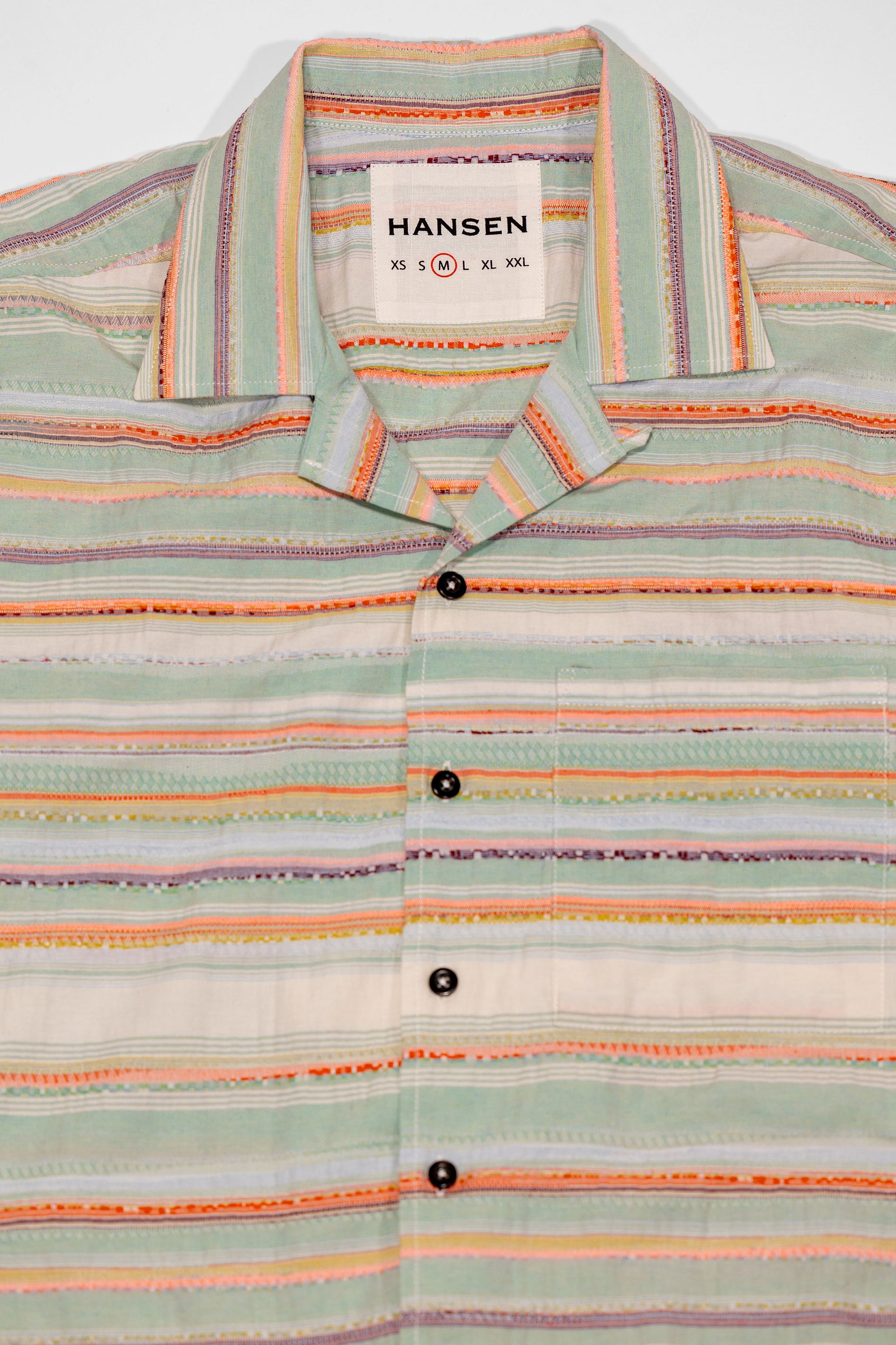 Hansen Garments Caleb Short Sleeve Cabana Shirt - Multicolor - product shot - front facing - white backdrop - close up of collar, buttons, and shirt