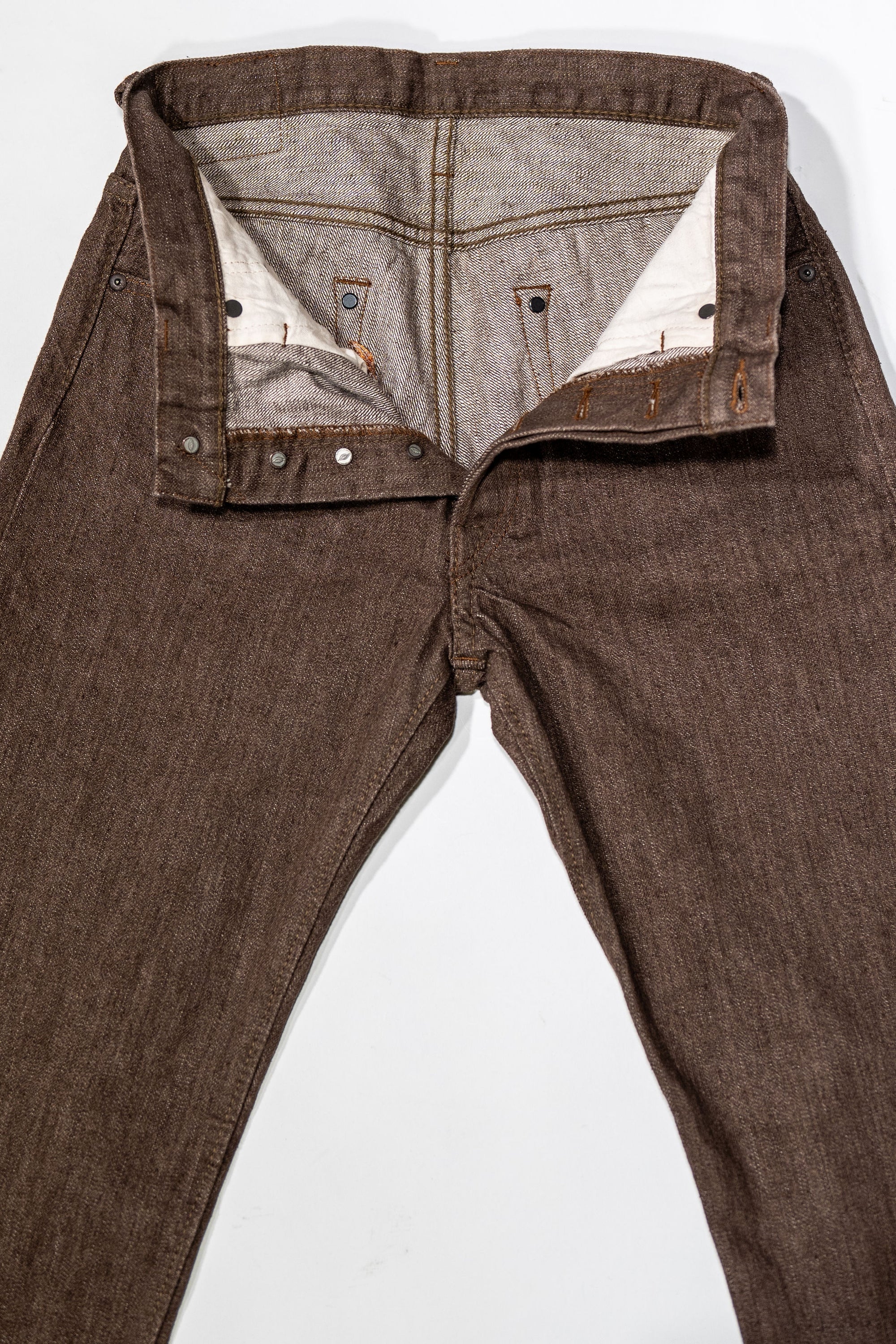 Pure Blue Japan BR-14oz-003 Regular Straight - 14oz Brown x White. laid on back with front buttons undone and opened