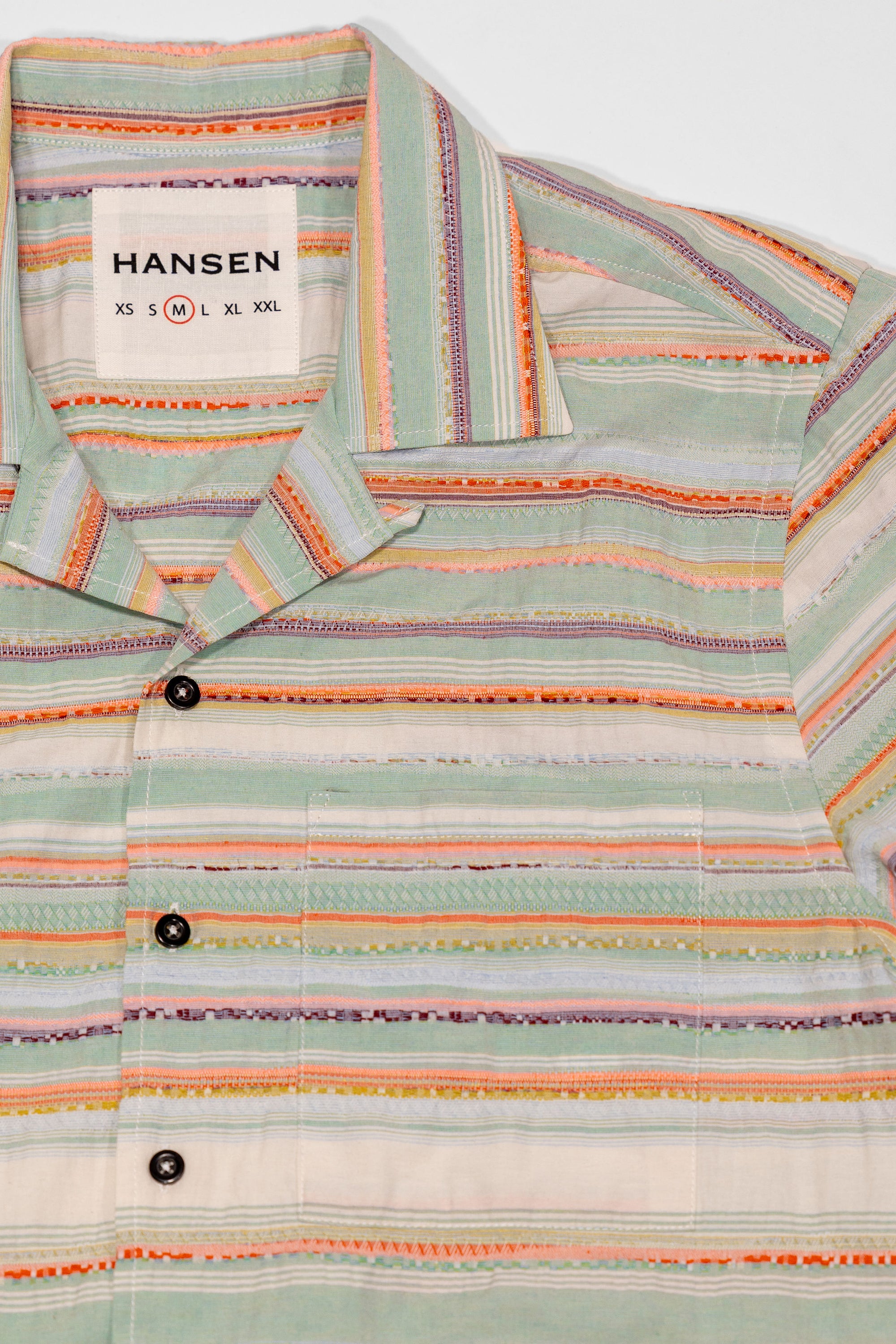Hansen Garments Caleb Short Sleeve Cabana Shirt - Multicolor - product shot - front facing - white backdrop - close up of collar, buttons, pocket, and shirt