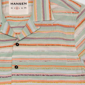 Hansen Garments Caleb Short Sleeve Cabana Shirt - Multicolor - product shot - front facing - white backdrop - close up of collar, buttons, pocket, and shirt
