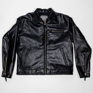 Black leather jacket laid flat on white. Shot from the front.