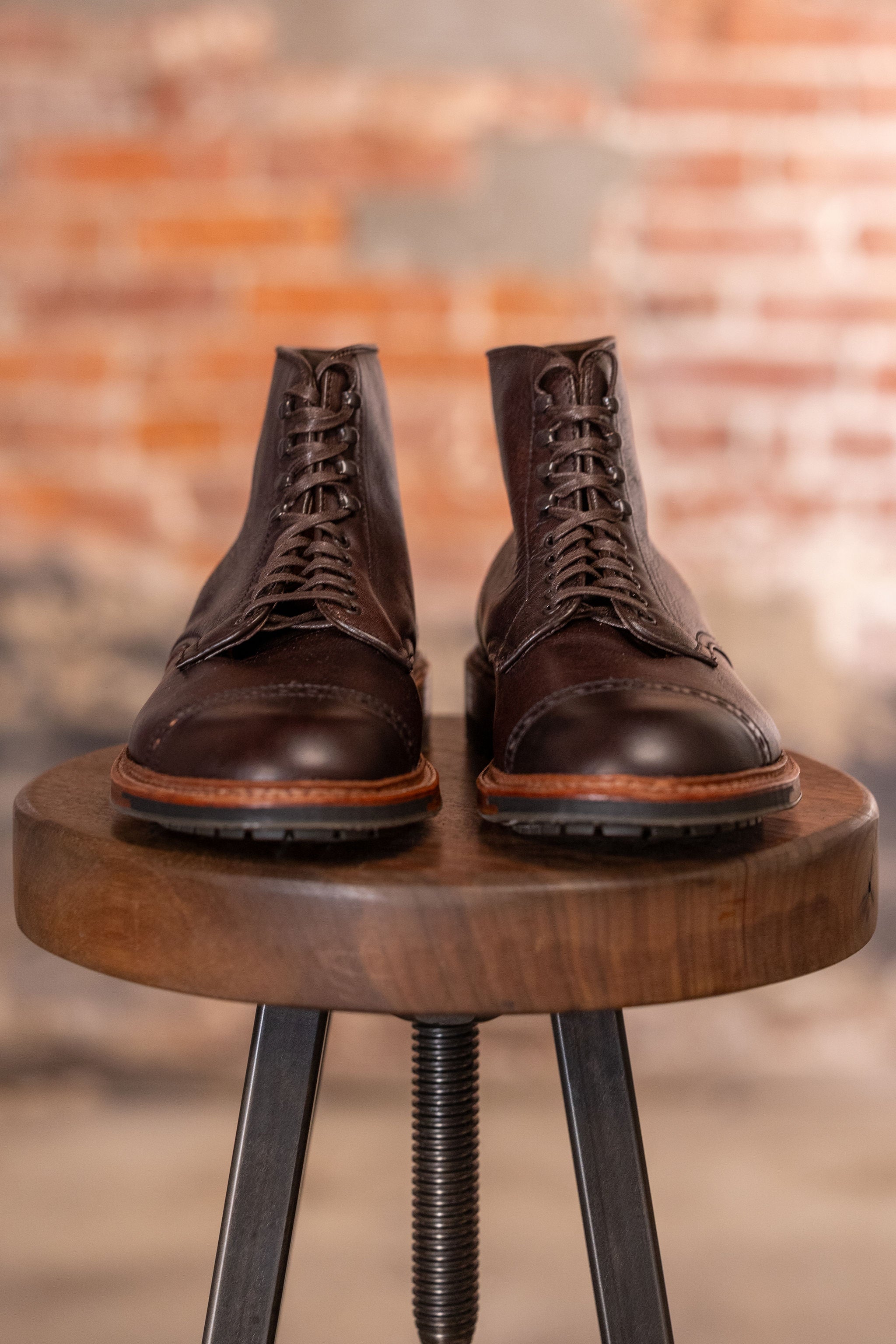 Brown leather cap toe boots front view