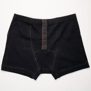 Hemen Biarritz Ribbed Boxer Brief - Solid Black. Laid on back
