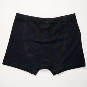 Hemen Biarritz Ribbed Boxer Brief - Solid Black. Laid on face.