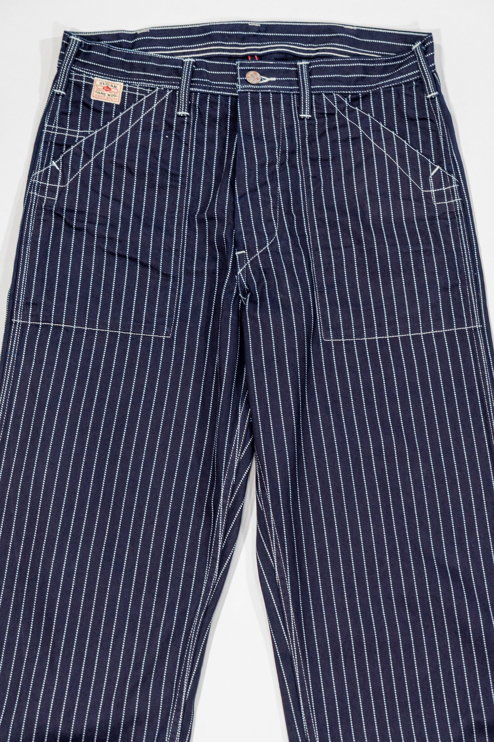 Navy striped fatigue pocket pants front view laying flat