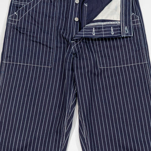 Navy striped fatigue pocket pants front view open fly laying flat