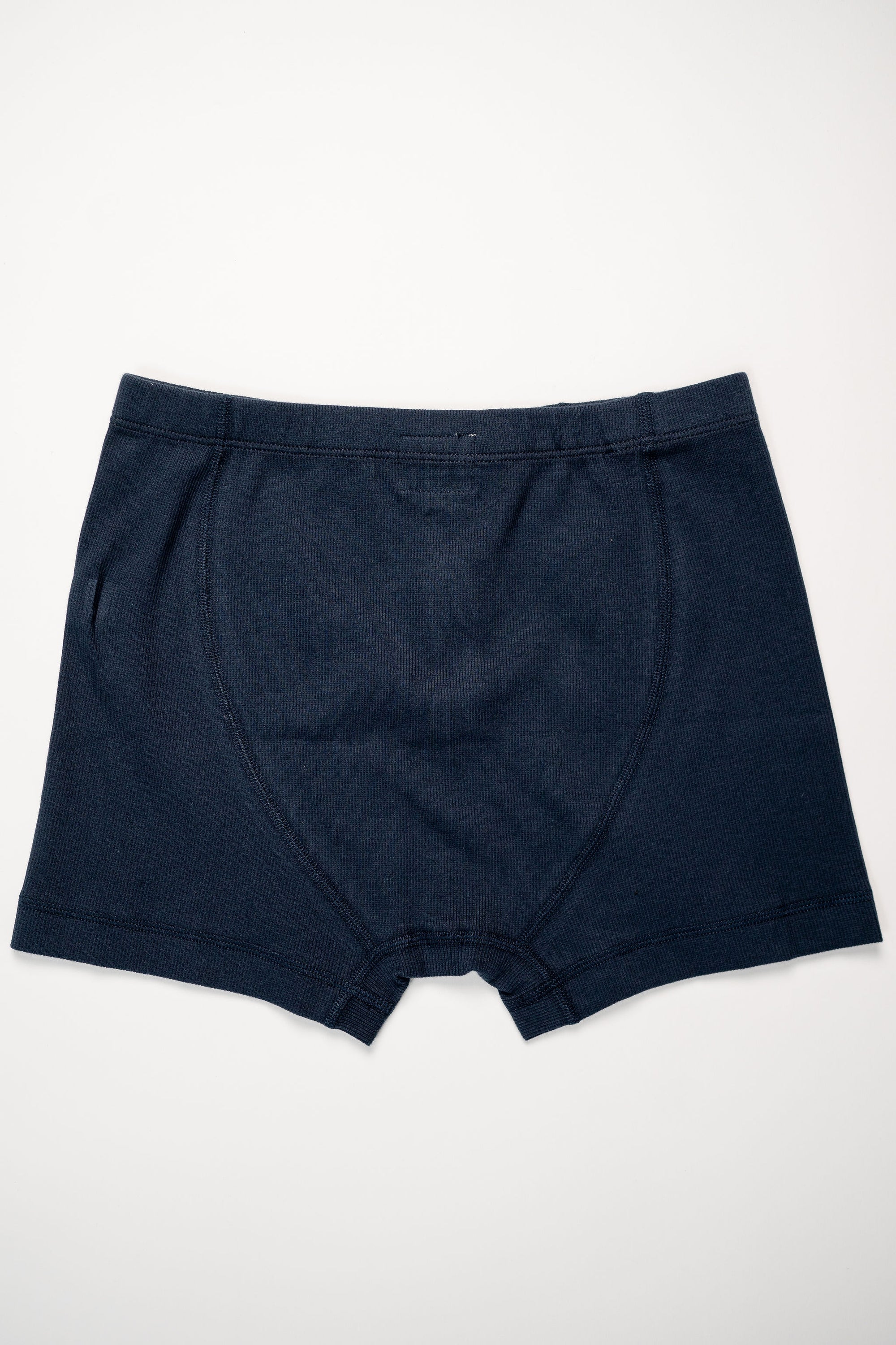 Hemen Biarritz Ribbed Boxer Brief - Deep Marine. laid on face