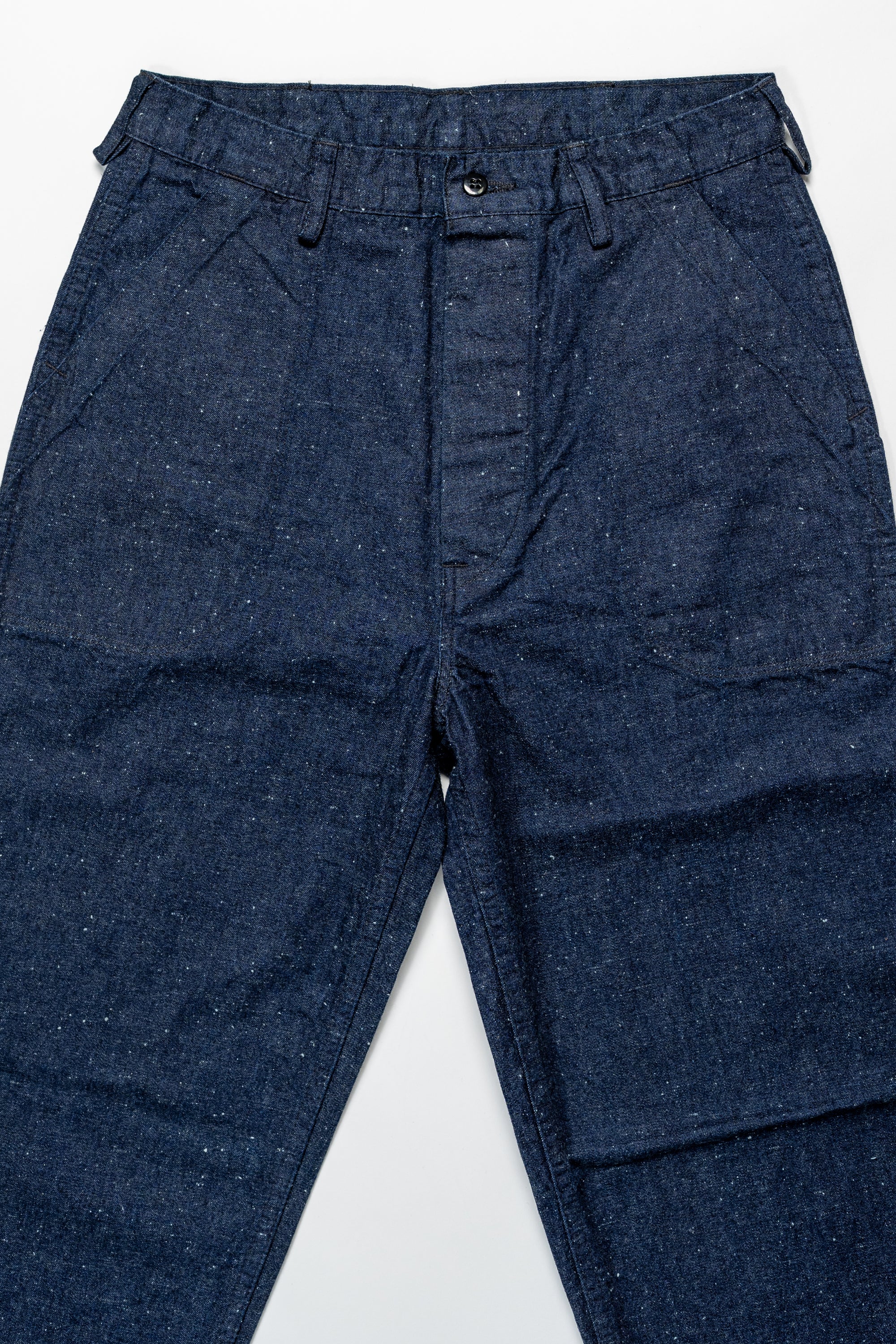 TCB Jeans Seamens Trousers - 10oz Neppy Denim Indigo One Wash. laid on back