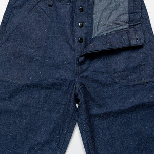 TCB Jeans Seamens Trousers - 10oz Neppy Denim Indigo One Wash. laid on back with buttons undone