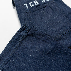 TCB Jeans Seamens Trousers - 10oz Neppy Denim Indigo One Wash. laid with back pocket showing with cuff showing