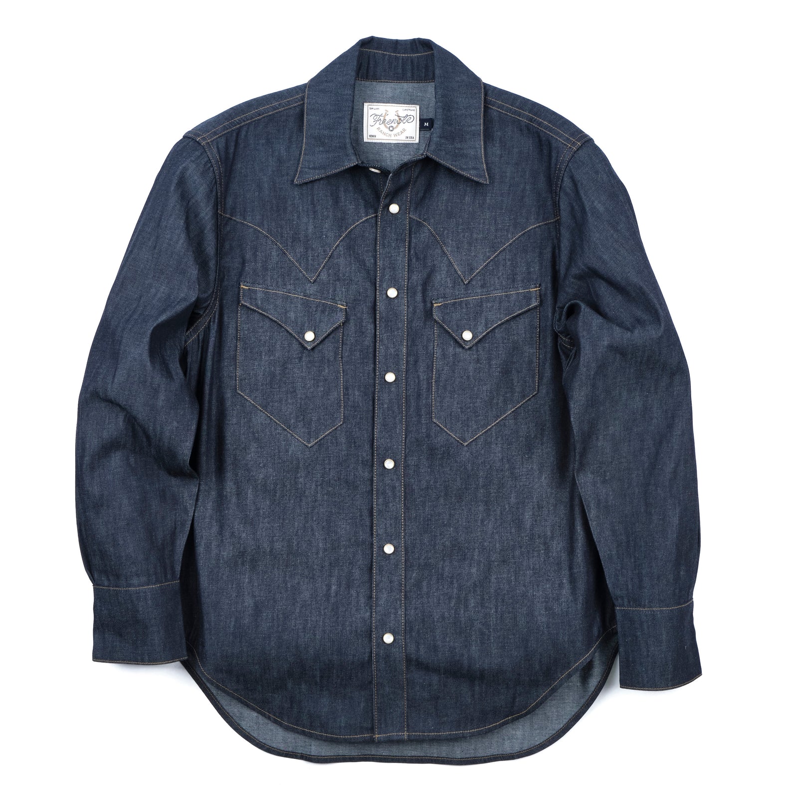 Dark indigo denim western-style shirt with white snaps and two snap chest pockets, laying flat front view