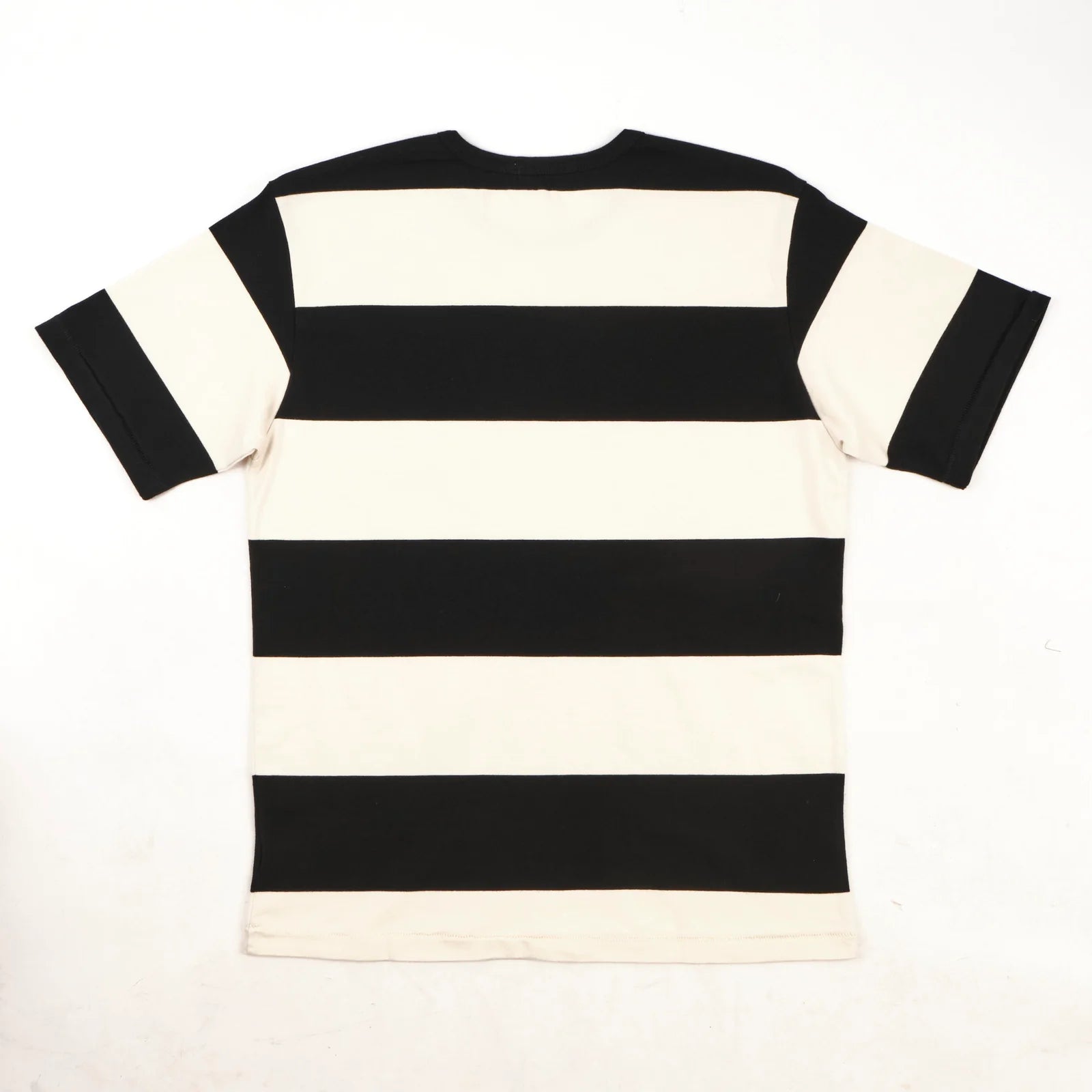 Freenote Cloth Mooch Tee - Black Stripe. laid on front