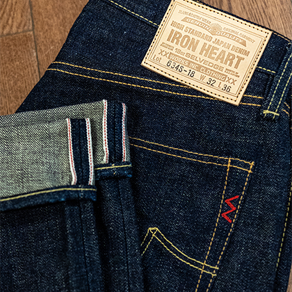 Close up of the tag and cuff of the Iron Heart 18oz Selvage