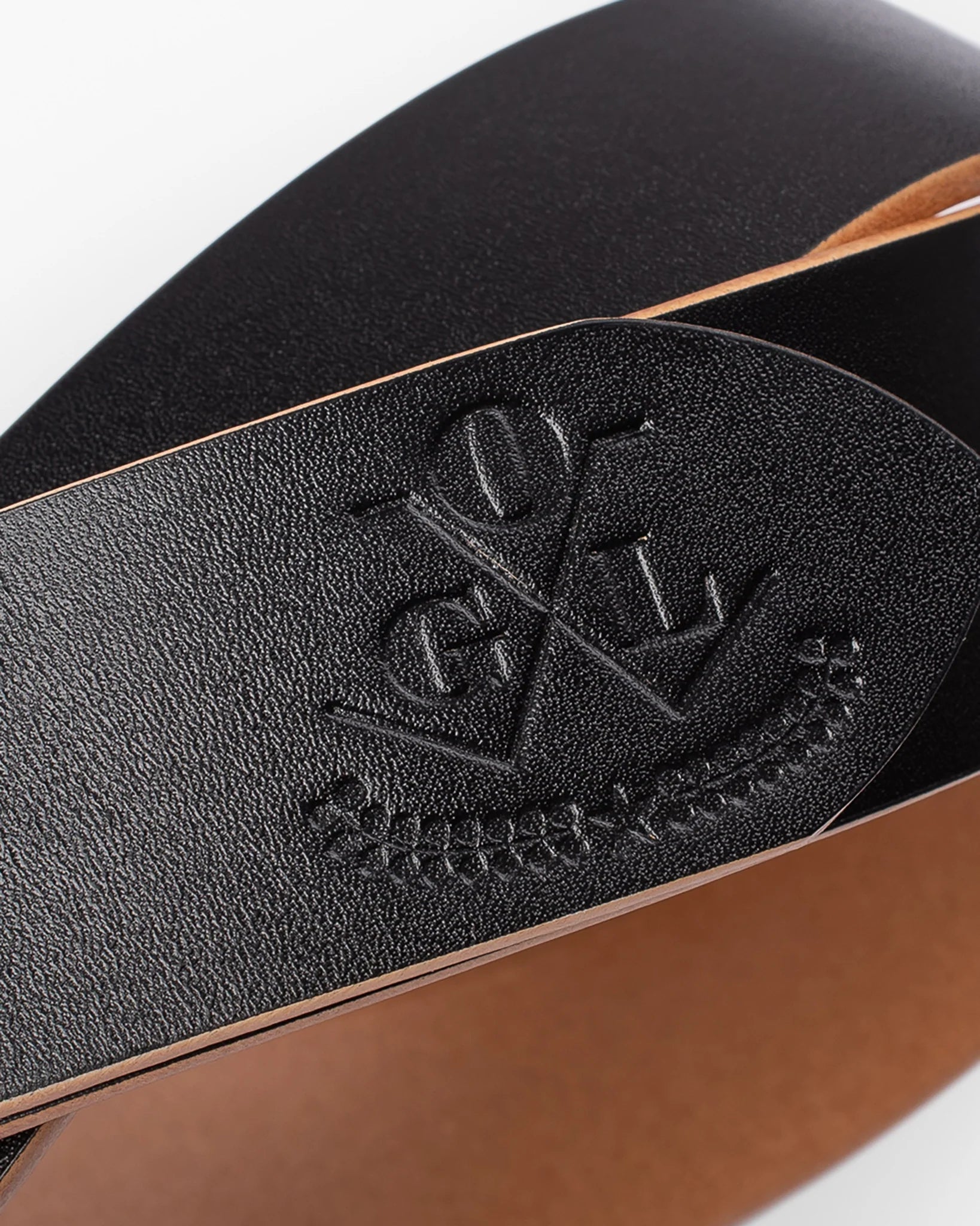 Obbi Good Label Single Prong Garrison Buckle Leather Belt - Hand-Dyed Black - Embossed logo on tip of belt