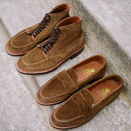 A pair of boots and a pair of Alden mocs