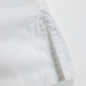 Hansen Garments Caleb Short Sleeve Cabana Shirt - White - product shot - front facing - detail shot of side seam