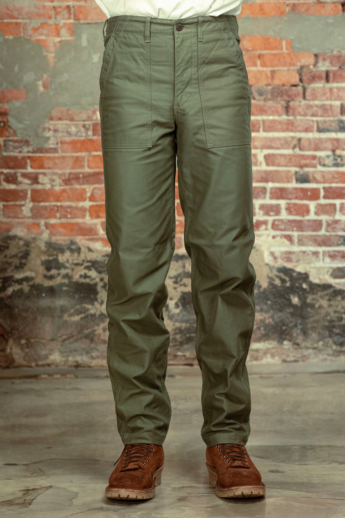 Olive fatigue pocket straight cut pants front view on model
