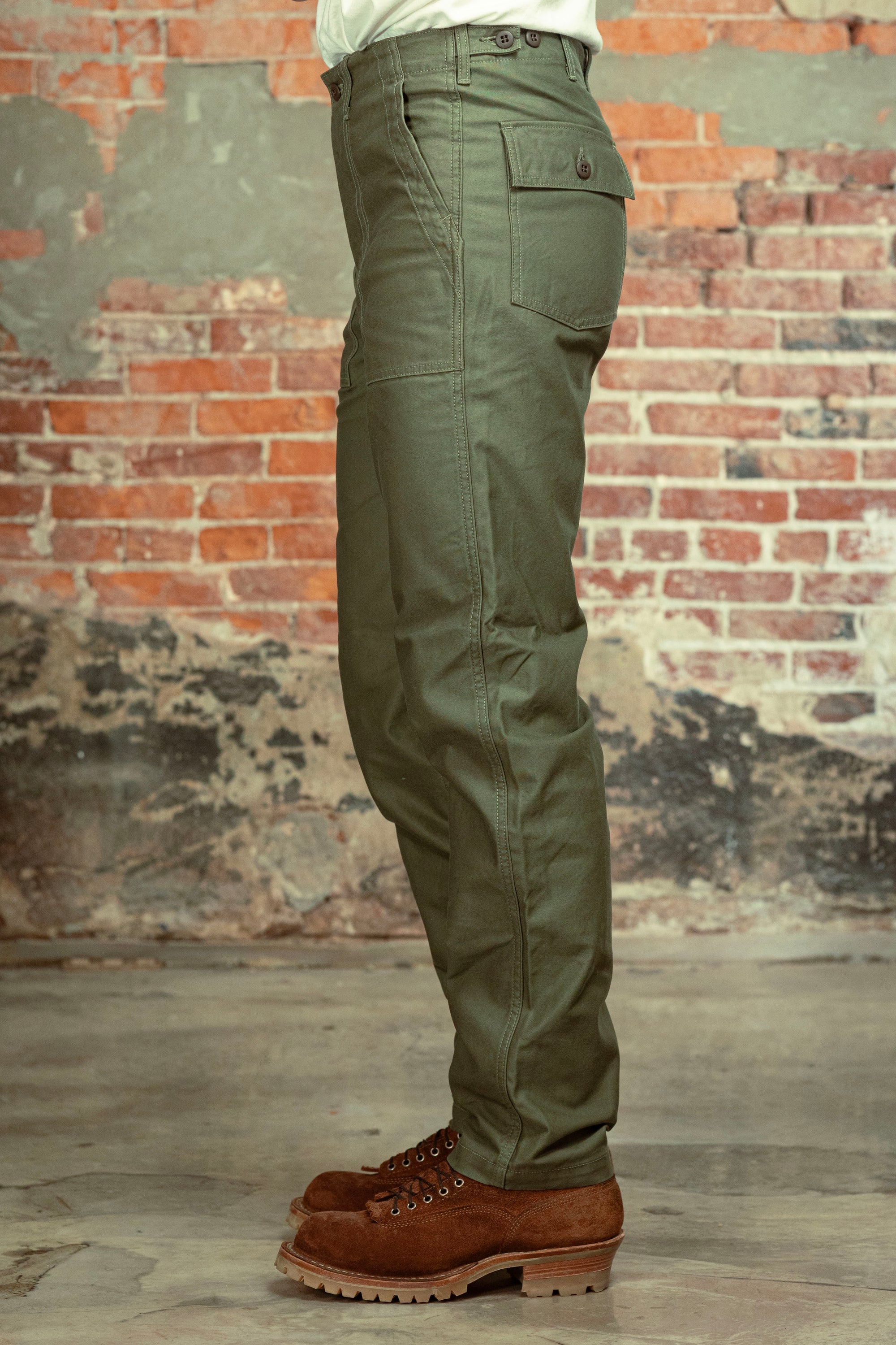 Olive fatigue pocket straight cut pants side view on model