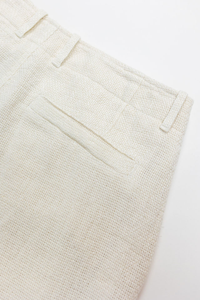 Hansen Garments Bobby Wide Pleated Trousers - Off White Gauze - product shot - close up - back facing - detail of pants pocket - white background