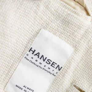 Hansen Garments Charlie Three Button Blazer - Off White Gauze - product shot - close up detail of tag, fabric, and button