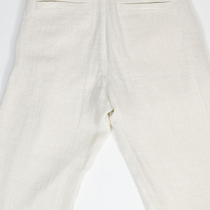 Hansen Garments Bobby Wide Pleated Trousers - Off White Gauze - product shot - back facing - detail of pants pockets - white background