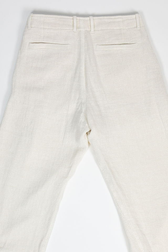 Hansen Garments Bobby Wide Pleated Trousers - Off White Gauze - product shot - back facing - detail of pants pockets - white background