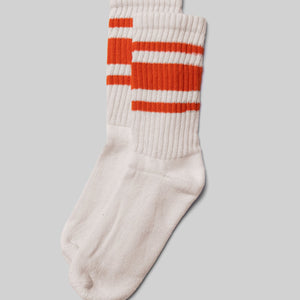 American Trench Retro Mono Sock in natural white with orange stripes laid flat